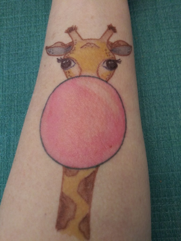 Giraffe with bubble gum